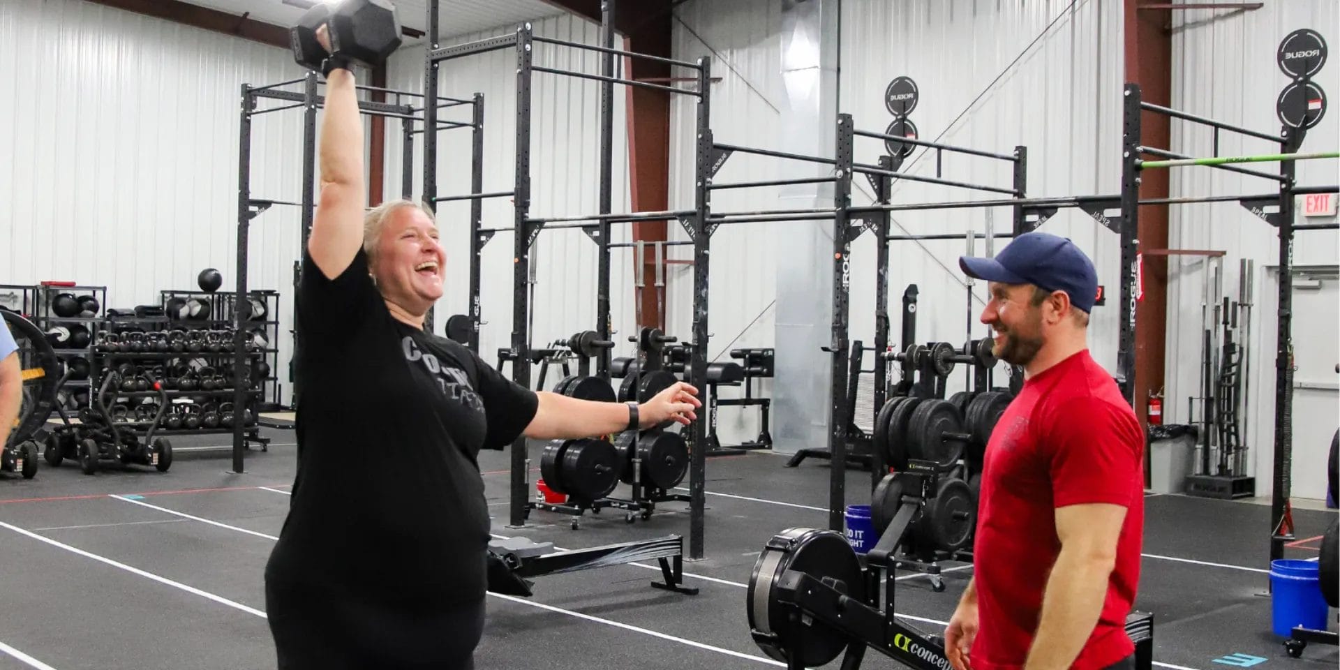 CrossFit Tiffin Woman Lifting Dumbbell